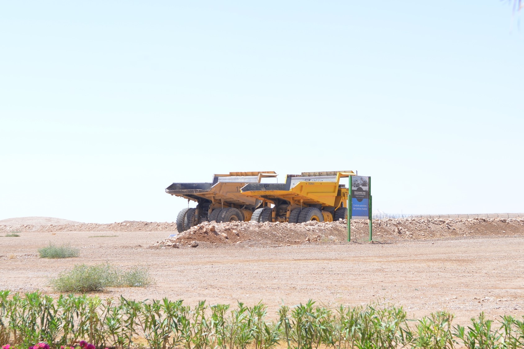 The Benguerir Experimental Mine is an experimental platform for R & D, technology transfer, innovation and learning in the mining industry, aiming to : put the mining industry at the forefront of technological progress; enable the Profession to conduct R&D projects and trials in an industrial environment; Deploy initial training, continuing education, training through research and learning by doing; attract technology developers, equipment suppliers and universities for testing and co-developing of new technologies; develop an ecosystem through the valorization of the results of R & D, innovation and technology transfer. The current perimeter of the experimental mine concerns the entire Benguerir mine which covers an area of 3,300 km² The objective of the Benguerir experimental mine is to develop innovative solutions in the field of the mining industry, able to meet the technological and socio-economic challenges of OCP and the African continent with regard to the following themes: Geological exploration. Extraction, beneficiation and exploitation of the ore. Environment, rehabilitation and sustainability. Digitalization. Training and skills development. In order to operationalize the Experimental Mine projects related to the phosphate industry are being implemented. These projects fall under the following themes: management and information system, Artificial Intelligence, automation and autonomous driving, advanced maintenance, mining rehabilitation & sustainability, online measurement and development of new technologies. The Benguerir Experimental Mine, as a Living Lab, is now open on its national and African ecosystem, including the launch of the Mining Challenge program and the organization of thematic events such as the “ African Mining Industry : challenges & Sustainability ”.